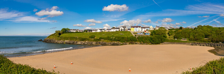 Pylons on the beach of Aberporth Bay, Ceredigion, Dyfed, Wales, UK