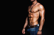 © sergiophoto - Muscular and sexy torso of young man in jeans