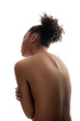 © Yakobchuk Olena - Attractive nude woman turning her back to camera, she is hunching her shoulders and embracing herself. Isolated on background