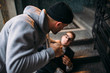 © Nomad_Soul - Street theif commits a robbery attack on a man