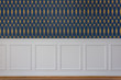 White wood trim and blue wallpaper