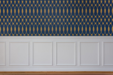 white wood trim and blue wallpaper