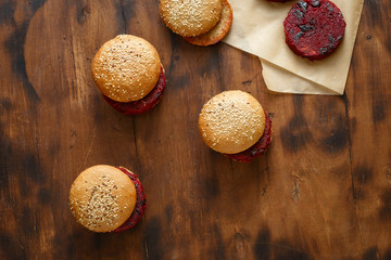 Poster - Vegetarian burgers with beet cutlets with prunes top view