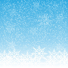 Snowflakes on a blue bokeh background Vektor.
