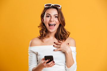 Sticker - Happy young woman using mobile phone.