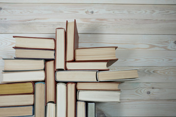 stack of old books pastel colors