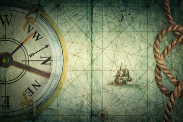 Aufkleber - Compass on vintage map. Adventure, travel, stories background. 