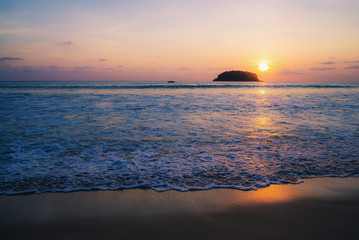 Beach sunset or sunrise with colorful of sky and cloud in twilight