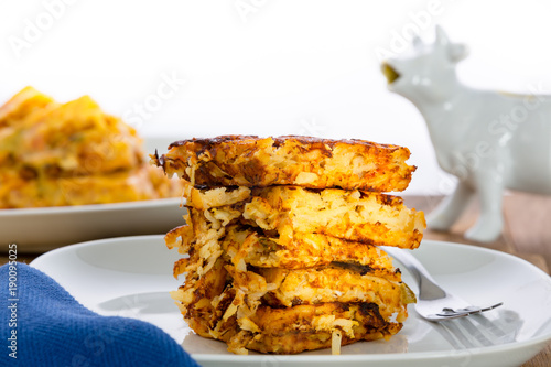 Fotografía Stack of crispy waffle hash browns on a plate