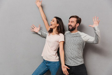 Sticker - Portrait of a cheerful young couple celebrating