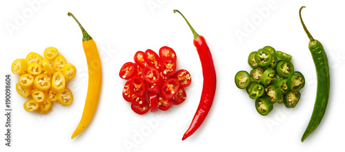Fotomural Whole and chopped colorful chili peppers