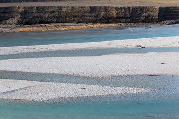 Diagonal line of river coast with low level of water, Empty accumulation lake, Most na Soci, Slovenia, water background