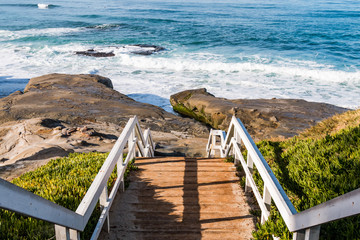 Staircase and landing for beach access to Windansea Beach in La Jolla, California.