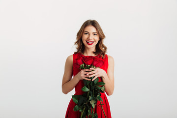 Poster - Full length portrait of a smiling young woman