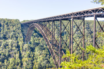 Wall Mural - Overlook of West Virginia green mountains in spring, summer or autumn fall at New River Gorge Bridge with closeup of metal structure