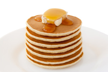 Wall Mural - Pancakes Stack with Maple Syrup and Butter isolated on a white background. Food. Family Breakfast. Shrove Tuesday. Mardi Gras. Brunch. Snacks. Sweets. Dessert.