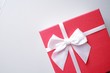 © Charlie's - Valentine present. Gift box and red ribbon for romantic couple.