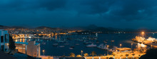 Mindelo In Twilight. Port Town With Many Boats In The Bay On The Cape Verde In The Northern Part Of The Island Sao Vicente. Long Exposure Panoramic Shot