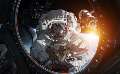 Leinwandbilder - Astronaut working on a space station 3D rendering elements of this image furnished by NASA