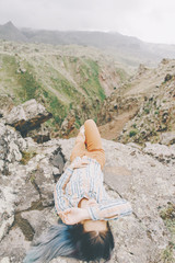 Poster - Woman resting in the mountains.