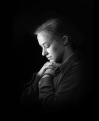 Wall Mural - Young woman praying