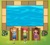 Fototapeta  - Three kids having fun by the pool