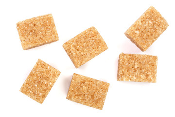 Wall Mural - brown sugar cubes isolated on white background. Top view. Flat lay