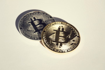 Wall Mural - pair of bitcoin coins isolated on white background, cryptocurrency investing
