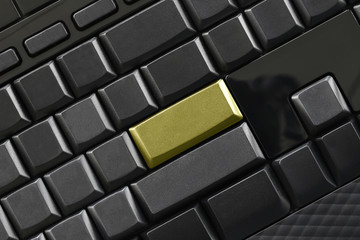 Empty black button and Golden Keypad enter of computer keyboard.