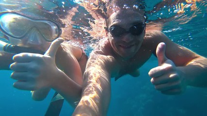 Wall Mural - father and daughter and snorkeling