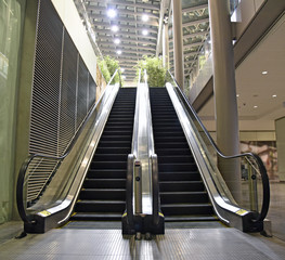 Indoor escalator with view looking up