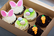 Assortment Of Easter Cupcakes In A Box