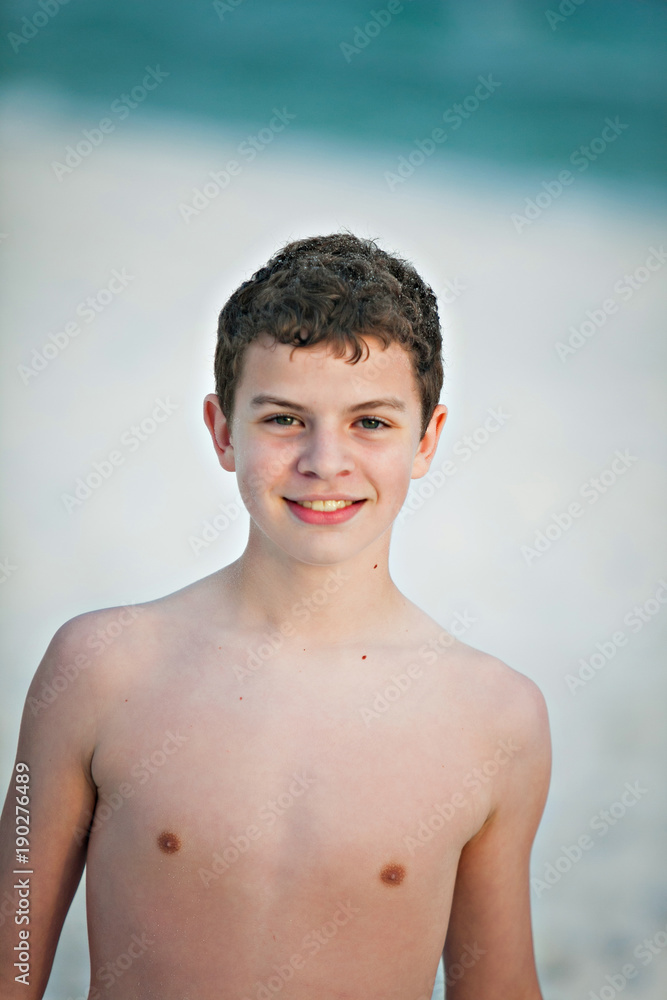 Tween at the beach stock photo adobe stock