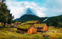 Typical Norwegian Old Wooden Houses With Grass Roofs In Innerdalen - Norway's Most Beautiful Mountain Valley, Near Innerdalsvatna Lake. Norway, Europe