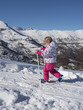 little girl tries to ski