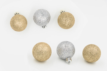 Pile of silver and gold xmas balls