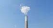 © leungchopan - Chimney and smoke over blue sky