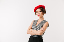 Portrait Of A Smiling Woman Dressed In Red Beret