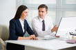 © chagin - Business people working together in the office