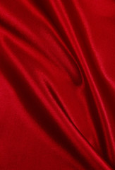 smooth elegant red silk or satin luxury cloth texture as abstract background. luxurious valentines d
