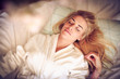 © liderina - Portrait of middle age woman in bed. Sleepy.