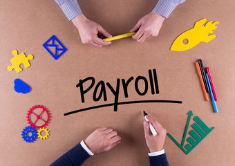 Wall Mural - Business Team with a single word Payroll