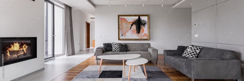 Villa living room with fireplace - obrazy, fototapety, plakaty 