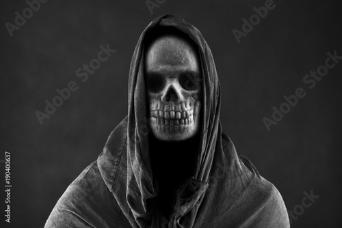 Fotografering  Grim reaper in the dark
