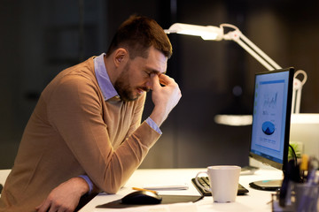 Poster - tired businessman working at night office