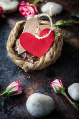 Canvas Print - Two Valentine's day hearts bounded together on nest.