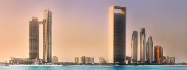 Canvas Print - View of Abu Dhabi Skyline at sunrise, UAE