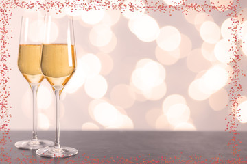 champagne glasses with hearts and Blurred background