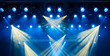 © Andrey Lapshin - Blue light rays from the spotlight through the smoke at the theater or concert hall. Lighting equipment for a performance or show.
