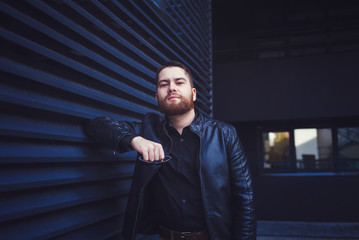 Wall Mural - Handsome brutal man in casual autumn clothes